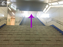 Go up the stairs at the exit of the underground passage.